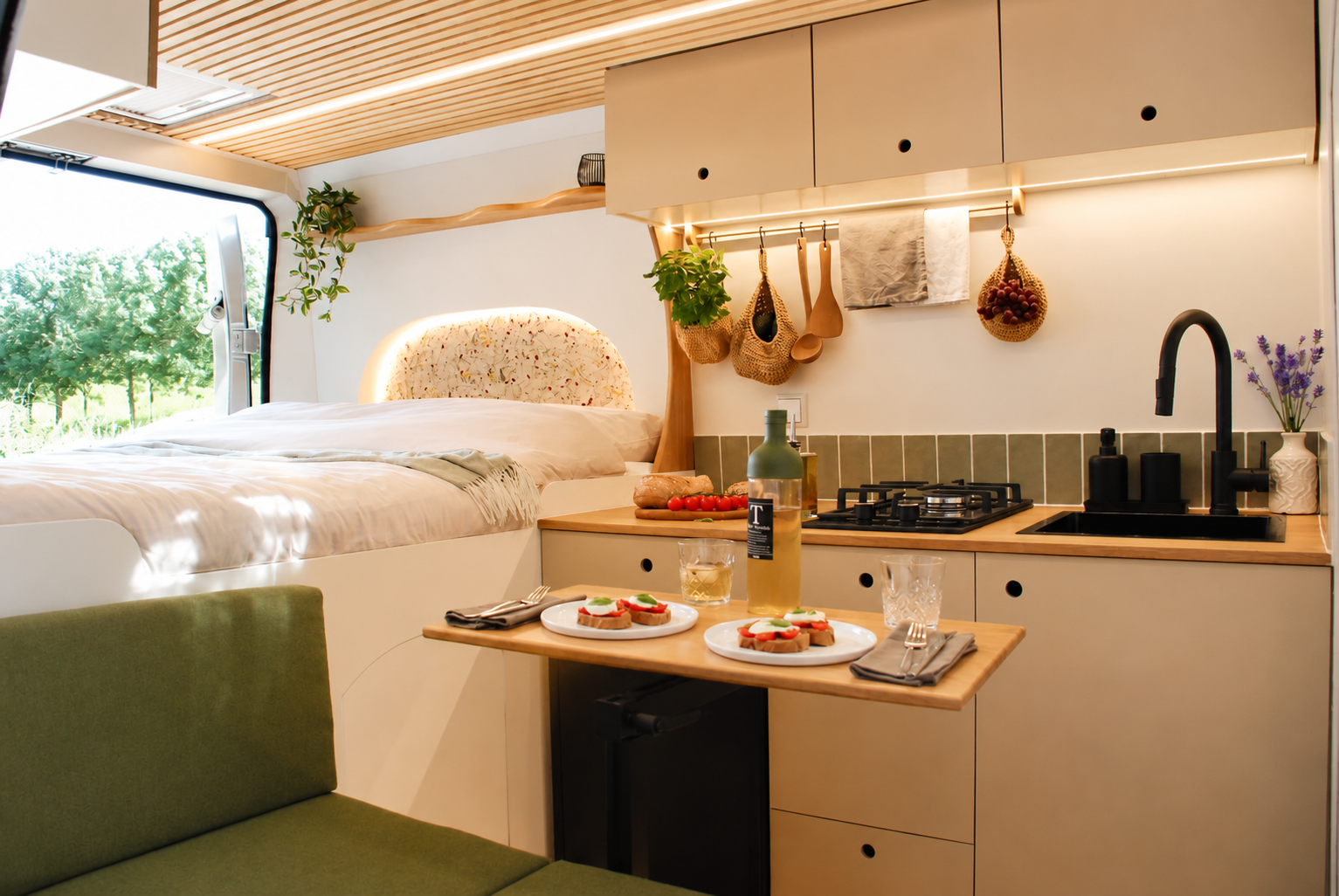Meadow campervan interior with dinner served